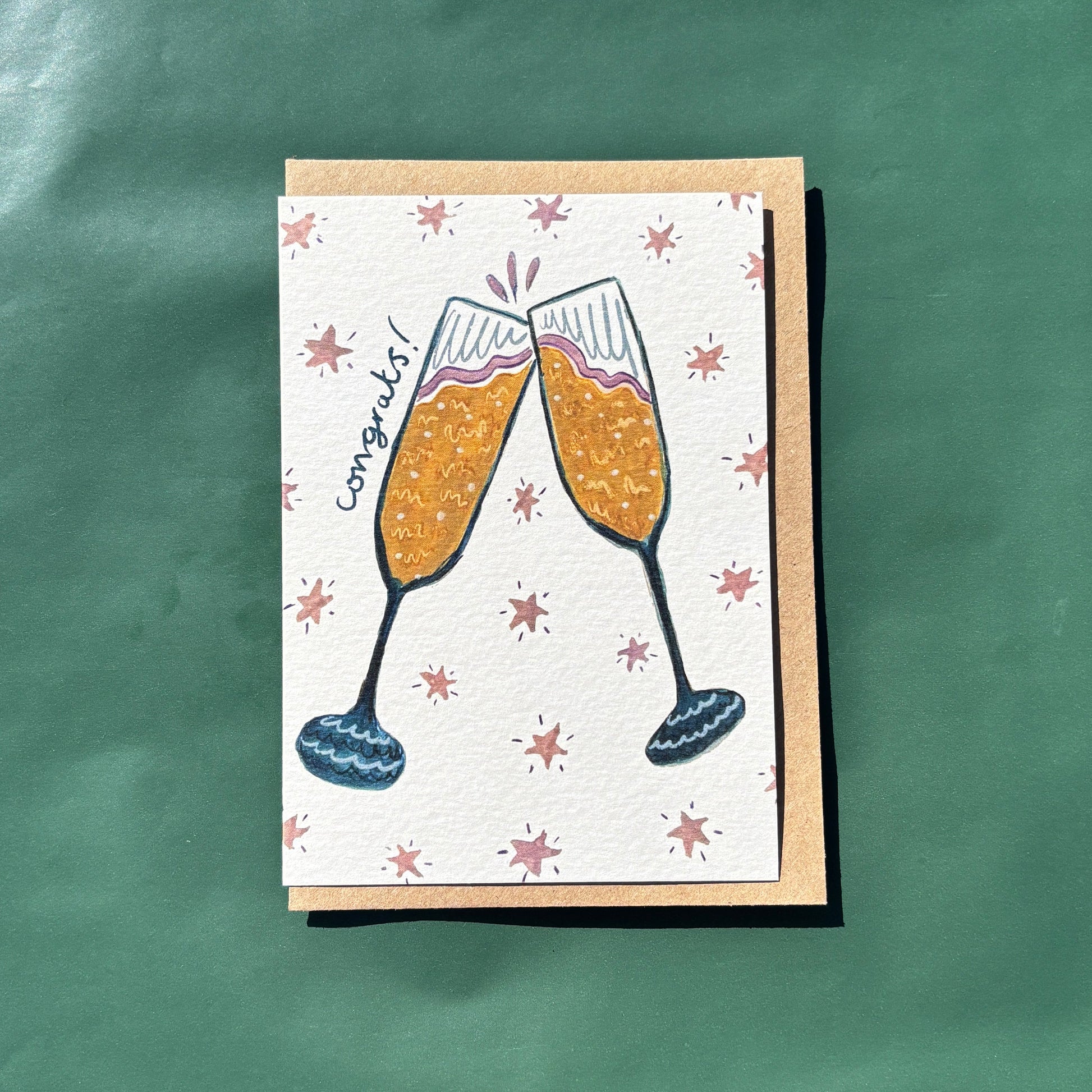 Card with champagne glass illustration and "congrats" text