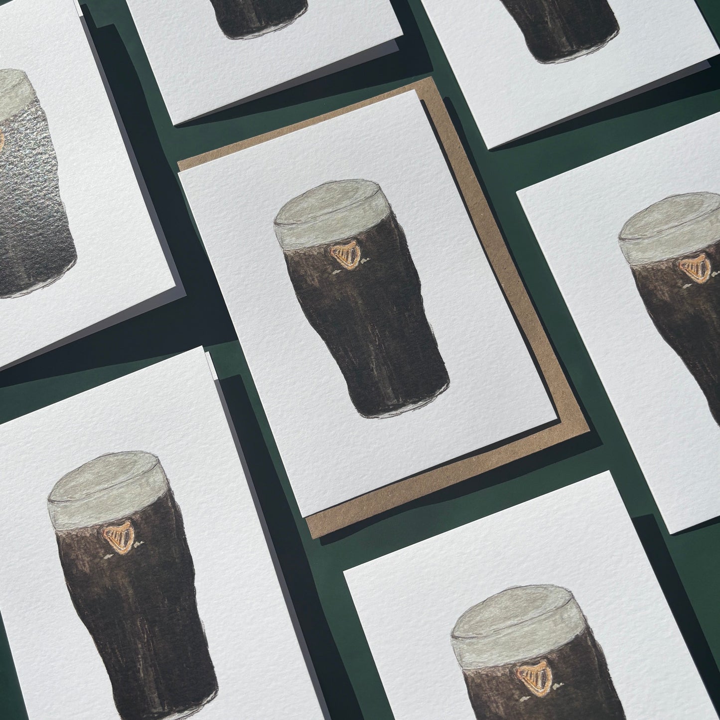 Set of greeting cards with illustrations of pints of guinness