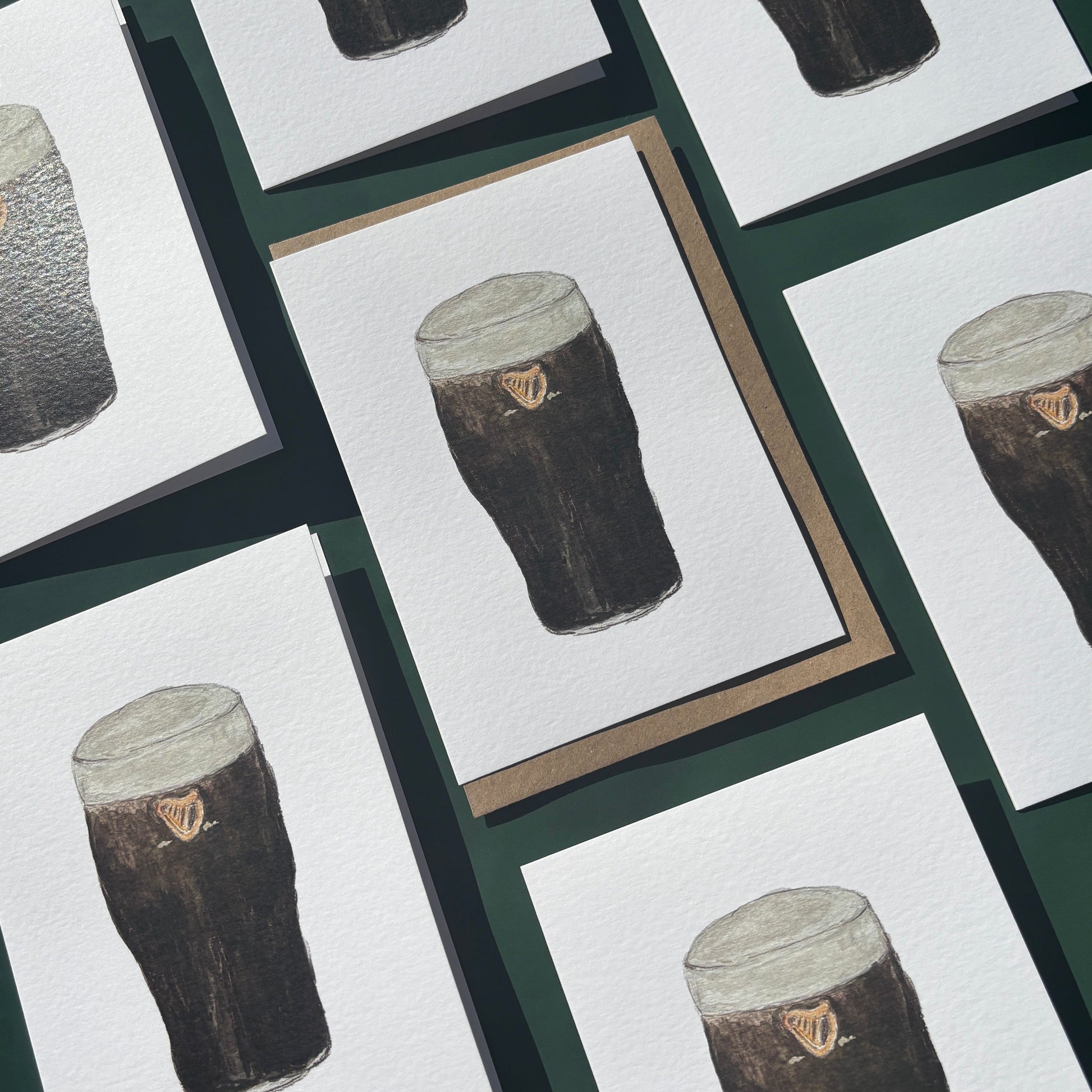 Set of greeting cards with illustrations of pints of guinness