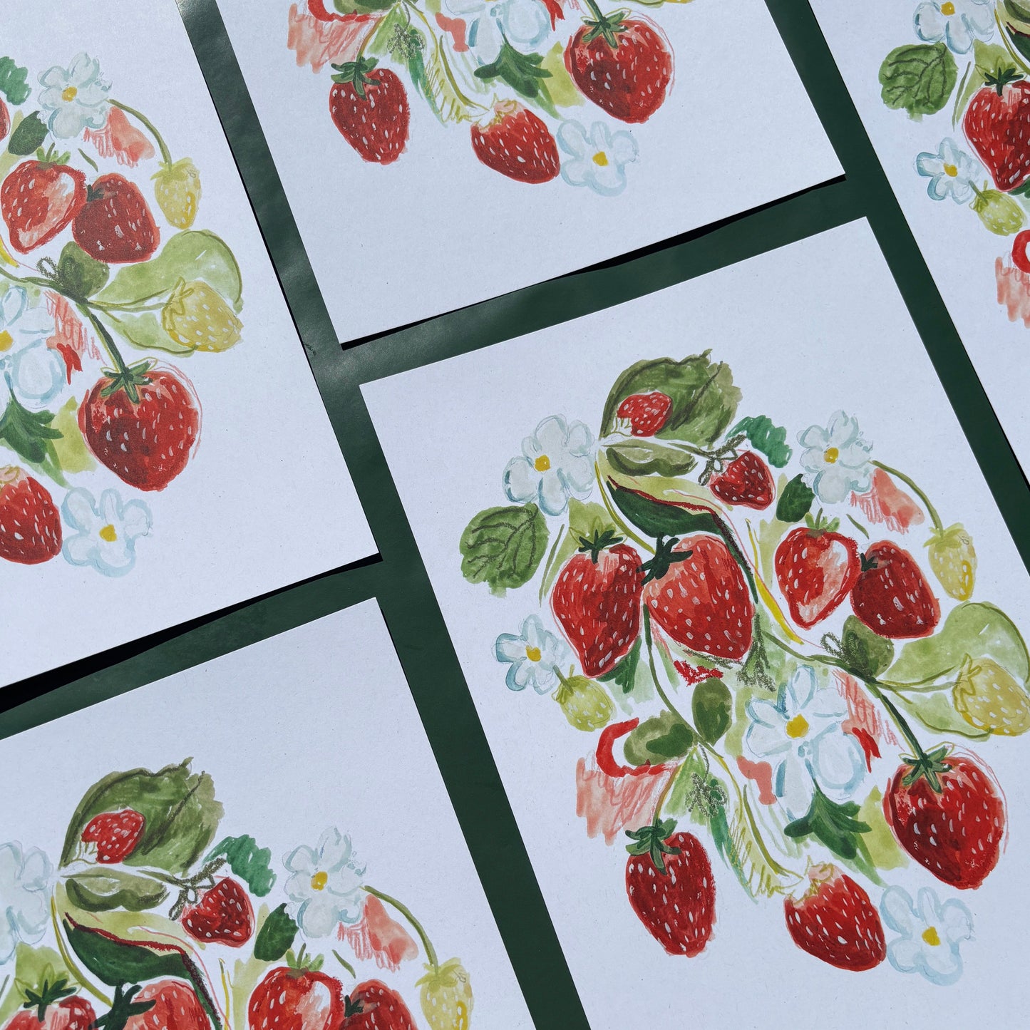 Set of art prints featuring strawberries and flower designs